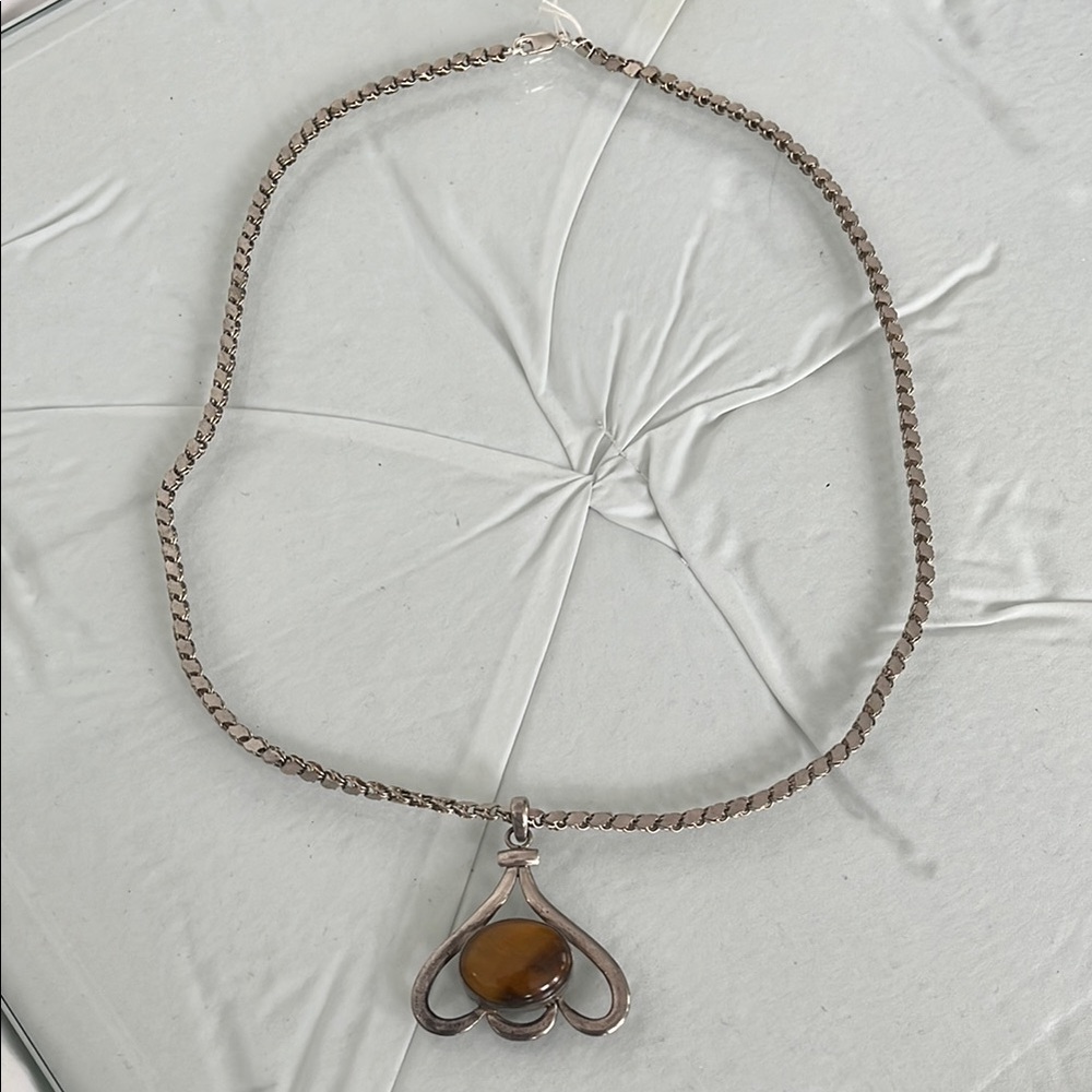 Elegant Silver Necklace with Brown Pendant